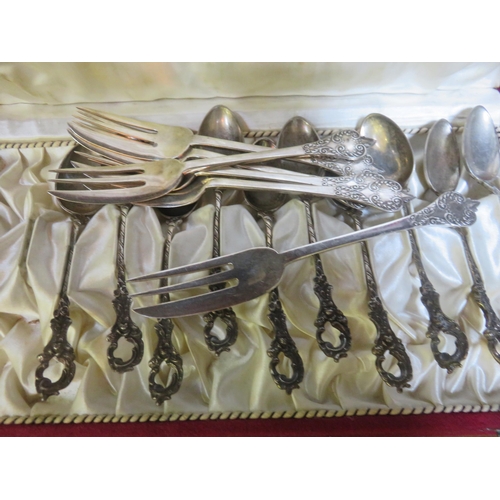 91 - Ten Continental Silver Teaspoons, Six Silver Cake Forks