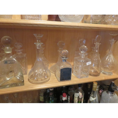 71 - Twelve various Glass Decanters