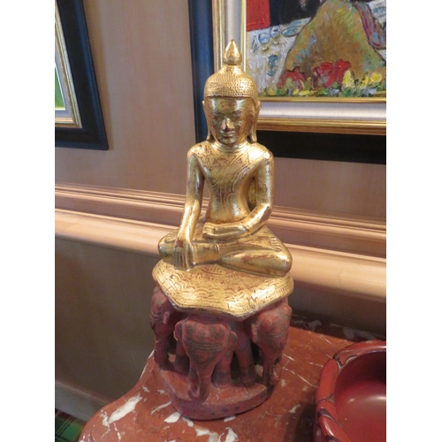 91 - Carved Gilt Wood Buddha Ornament on elephant stand