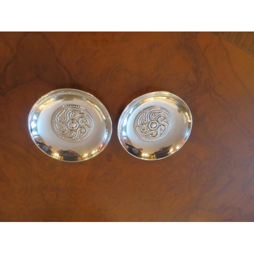 99 - Pair of Circle Silver Dishes, central medallion design, 4½ ins, diameter