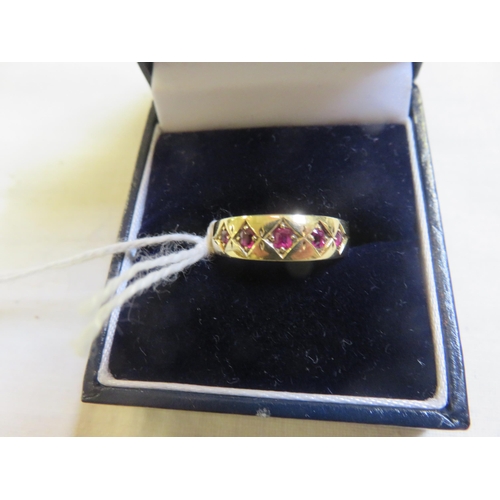 127 - 15ct Gold Five Stone Ruby Dress Ring