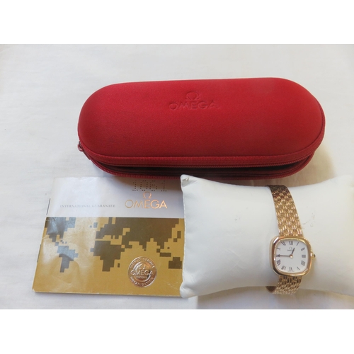 64 - 9ct Gold Omega Lady's Wristwatch - with Paperwork