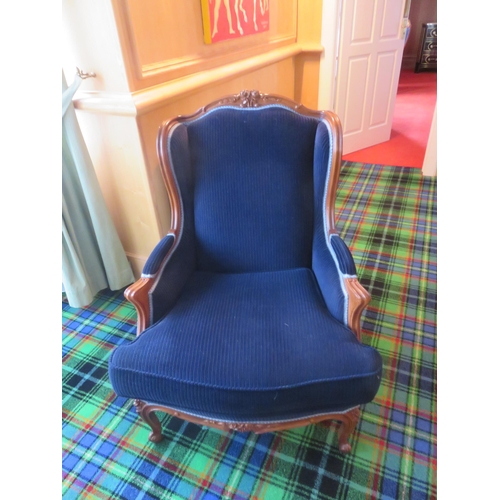 188 - Pair of Carved Wood Dark Blue Upholstered Wing ArmchairsStarting Bid 50 GBP