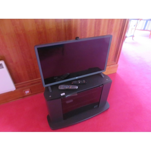 253 - Small LG Television on standStarting Bid 5 GBP