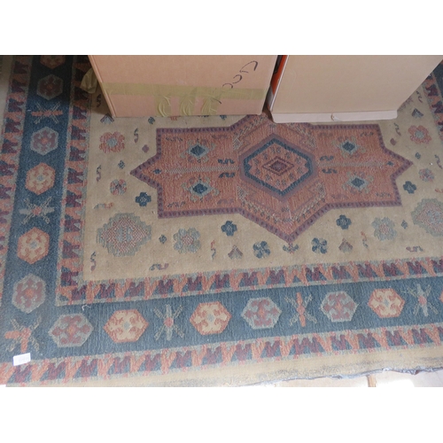 460 - Rug on brown ground, 85 x 66 ins.