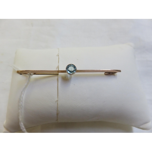 103 - Gold and aquamarine bar brooch