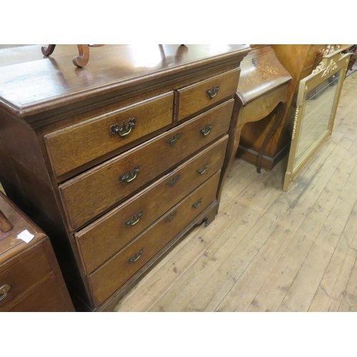 385 - Oak three long and two short chest of drawers