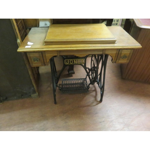 438 - Jones Treadle Sewing Machine