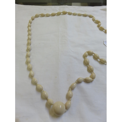 86 - Large string of bone beads