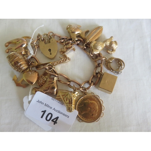 104 - 9ct Gold charm Bracelet 58.3grammes