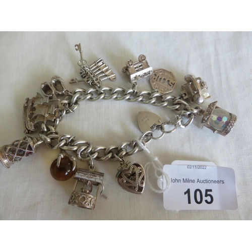 105 - Silver charm bracelet 77.1grams