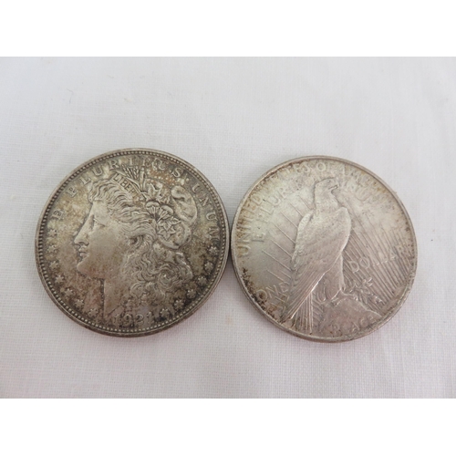 139 - 1921 and 1922 Silver Dollars