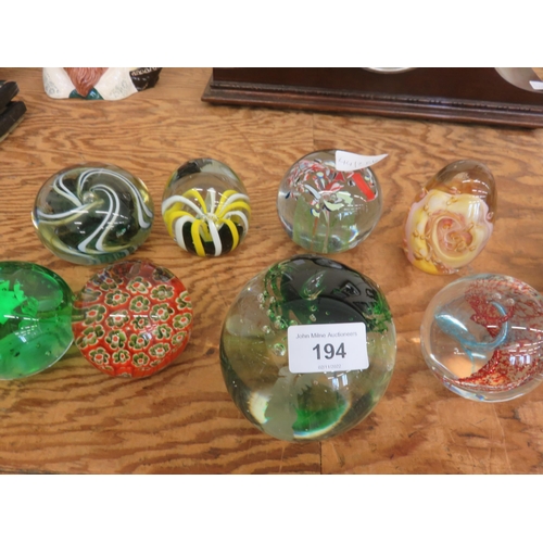 194 - 8 Glass Paperweights