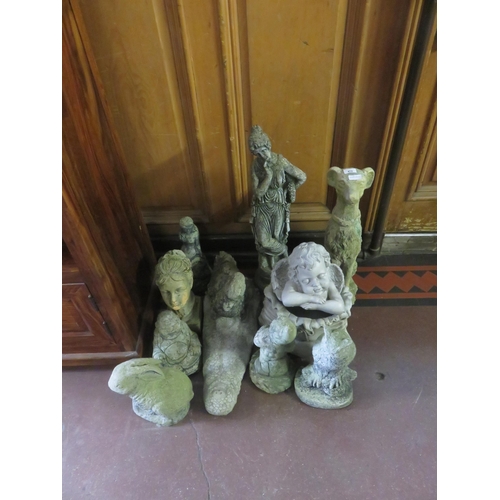 456 - Large lot of composite garden statutes