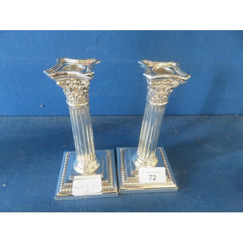 72 - Pair of Corinthian Style Sheffield Silver 7 ins.  tall candlesticks, fluted column on square base