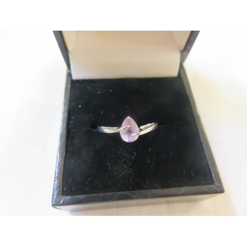 246 - 9ct. White Gold and Pink Stone Ring (stamped D.I.A.)