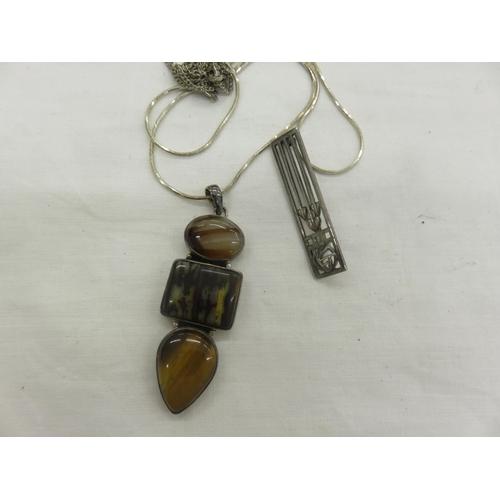 128 - Agate Type Pendant and a Rennie McIntosh Style Silver Brooch