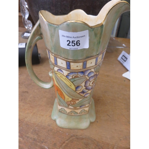 256 - Charlotte Rhead Jug on Green Ground