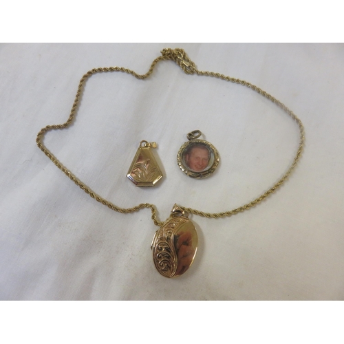 64 - Three Gilt Metal Lockets, one on 9ct. Gold Chain