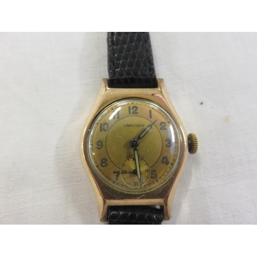 121 - Lady's 9ct gold faced Unicorn Watch