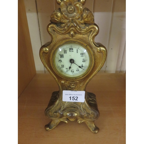 152 - Small Brass Tear Drop Clock