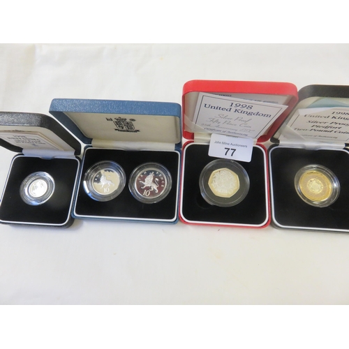 77 - Four various Cased Silver Collectors' Coins