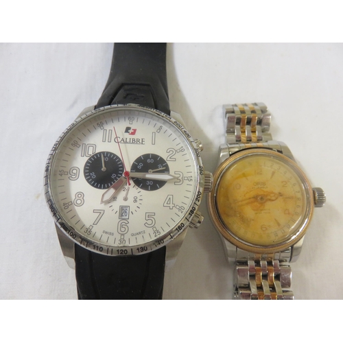 94 - Two odd Gents Wrist Watches