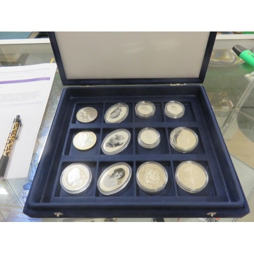 81 - Case containing 10 Silver and 2 other Royalty Coins