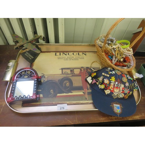 279 - Tray with Costume Jewellery, Model Plane, Baseball Cap with Badges, modern Metal Lincoln Panel Adver... 