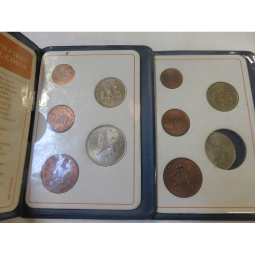 104 - Two Britain's First Decimal Coin Sets