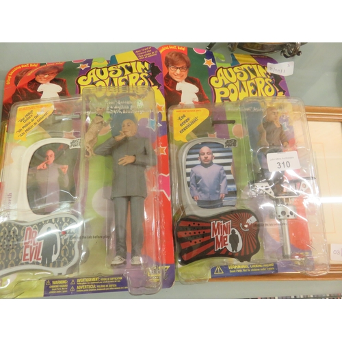 310 - Three boxed Austin Powers Toys