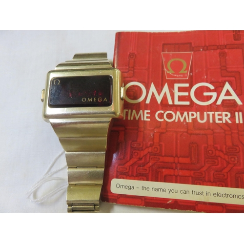 69 - Vintage Omega Time Computer II Wrist Watch and instruction booklet