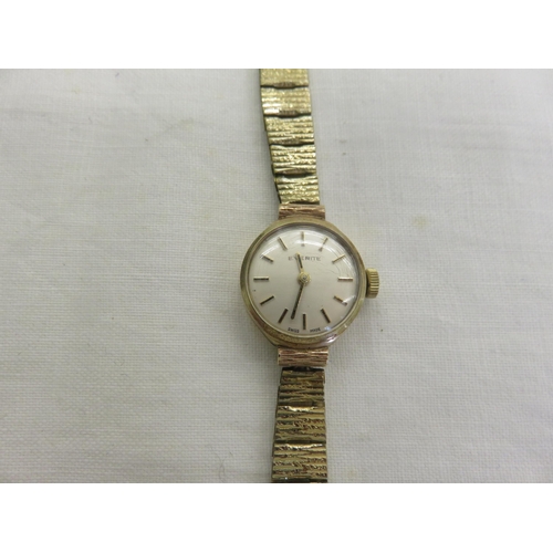 123 - 9ct. Gold Cased Ladies Everite Wrist Watch