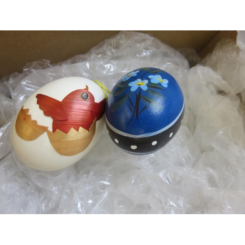 302 - Two Small Painted Ostrich Eggs