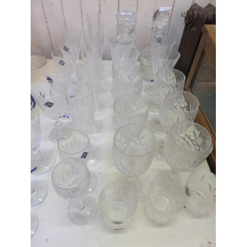 214 - Large Lot of Edinburgh Crystal Glasses, and Decanters