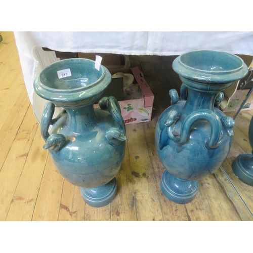 317 - Pair of large two handled Vases in Turquoise Ground