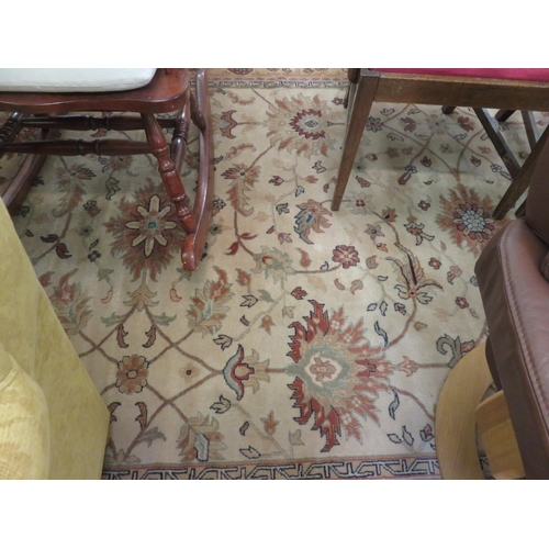 389 - Fringed Rug on Cream and Orange Ground with Floral Pattern