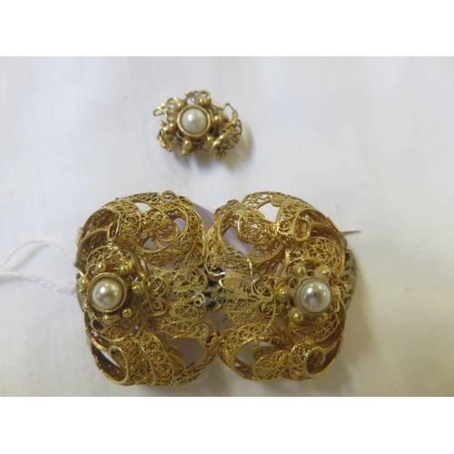 66 - Ornate Gilt Metal and Pearl Brooch and a similar earring