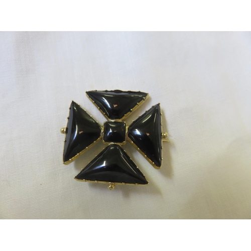 67 - Cira 1860's Gilt Metal and Onyx Cross Brooch