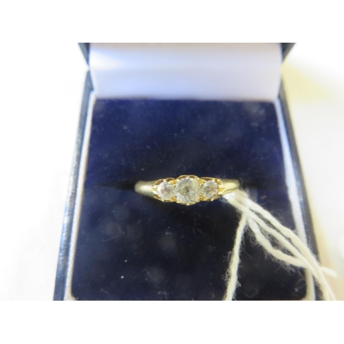 78 - 18ct Yellow Gold and Three Stone Diamond Ring