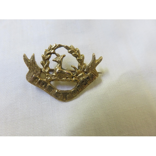 83 - Small 9ct gold military type brooch 3.6gms