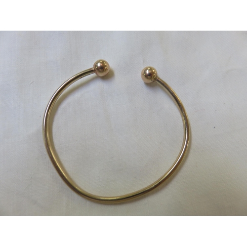 97 - 9ct Gold bangle 4 grams