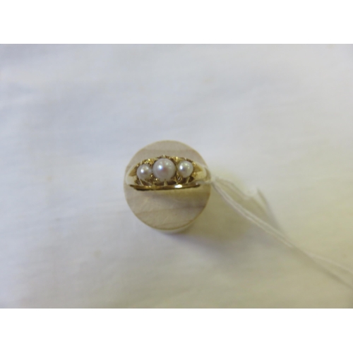 85 - 18ct Gold and Pearl Three Stone Ring