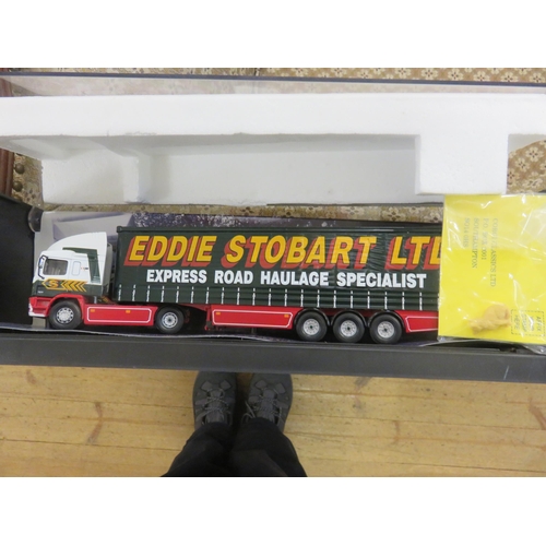 180 - Two Cased Corgi Trucks, Eddie Stobart & Q8