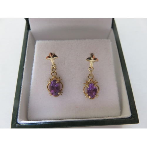 101 - Pair of Yellow Metal Amethyst Pendant Earrings