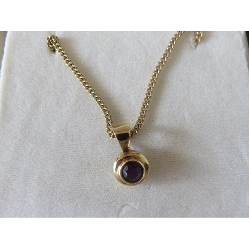 85 - Boxed 18ct Gold and Amethyst Circle Pendant on 18ct Gold Chain