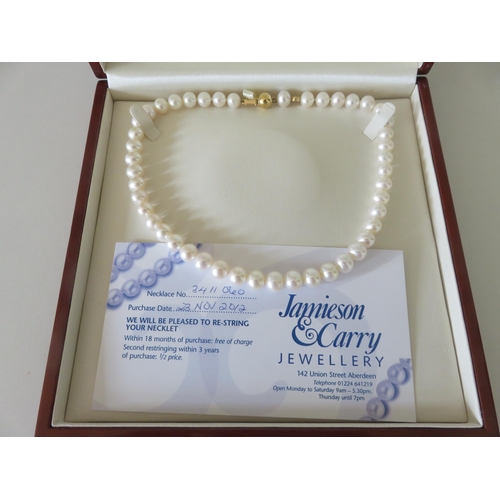 86 - Boxed Jamieson & Carry String of Pearls with 18ct Gold Clasp