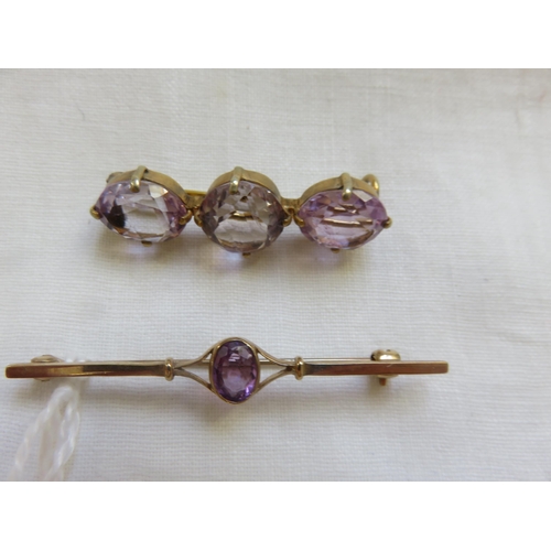 101 - 9ct Gold Amethyst Bar Brooch and One Similar