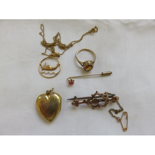 104 - 9ct Gold Brooch, 9ct Gold Pendant on Chain, 9ct Gold Dress Ring, Gilt Locket and a Stick Pin