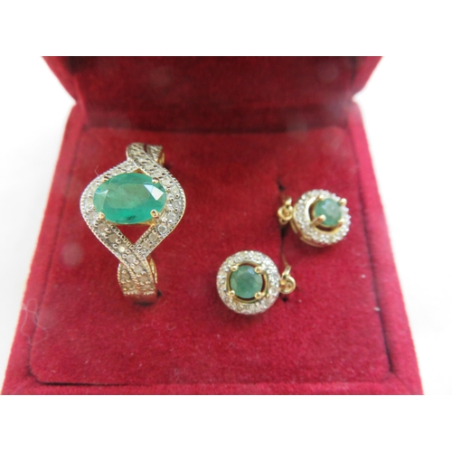 139 - 14ct Gold Emerald and Diamond Chip Dress Ring and a Pair of Matching Earrings